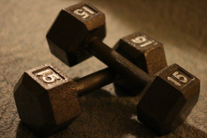 Strength training like with these dumbbells is key for a weight loss program.