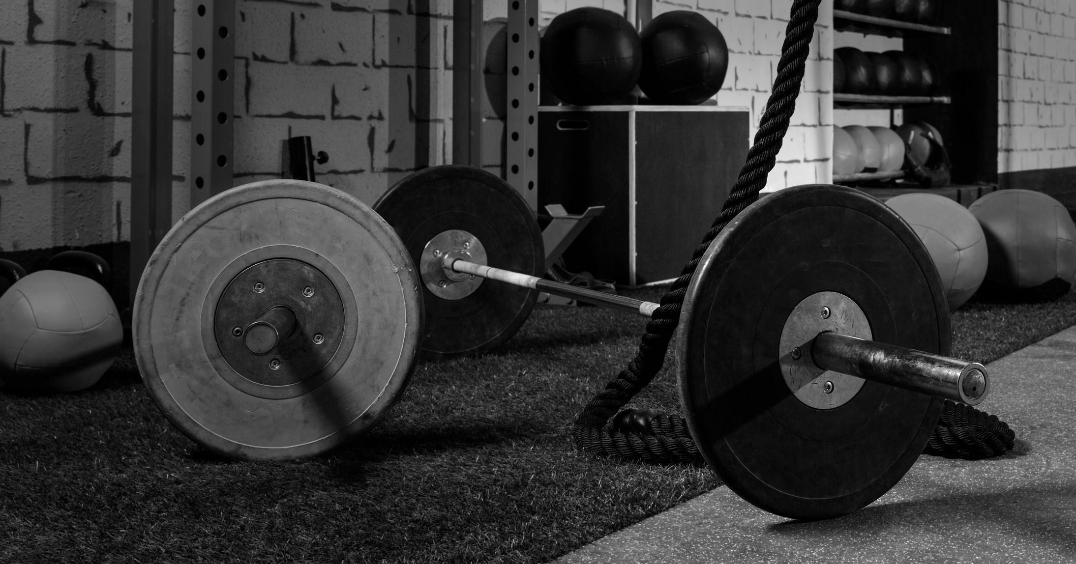Barbells in a gym bar bells and rope