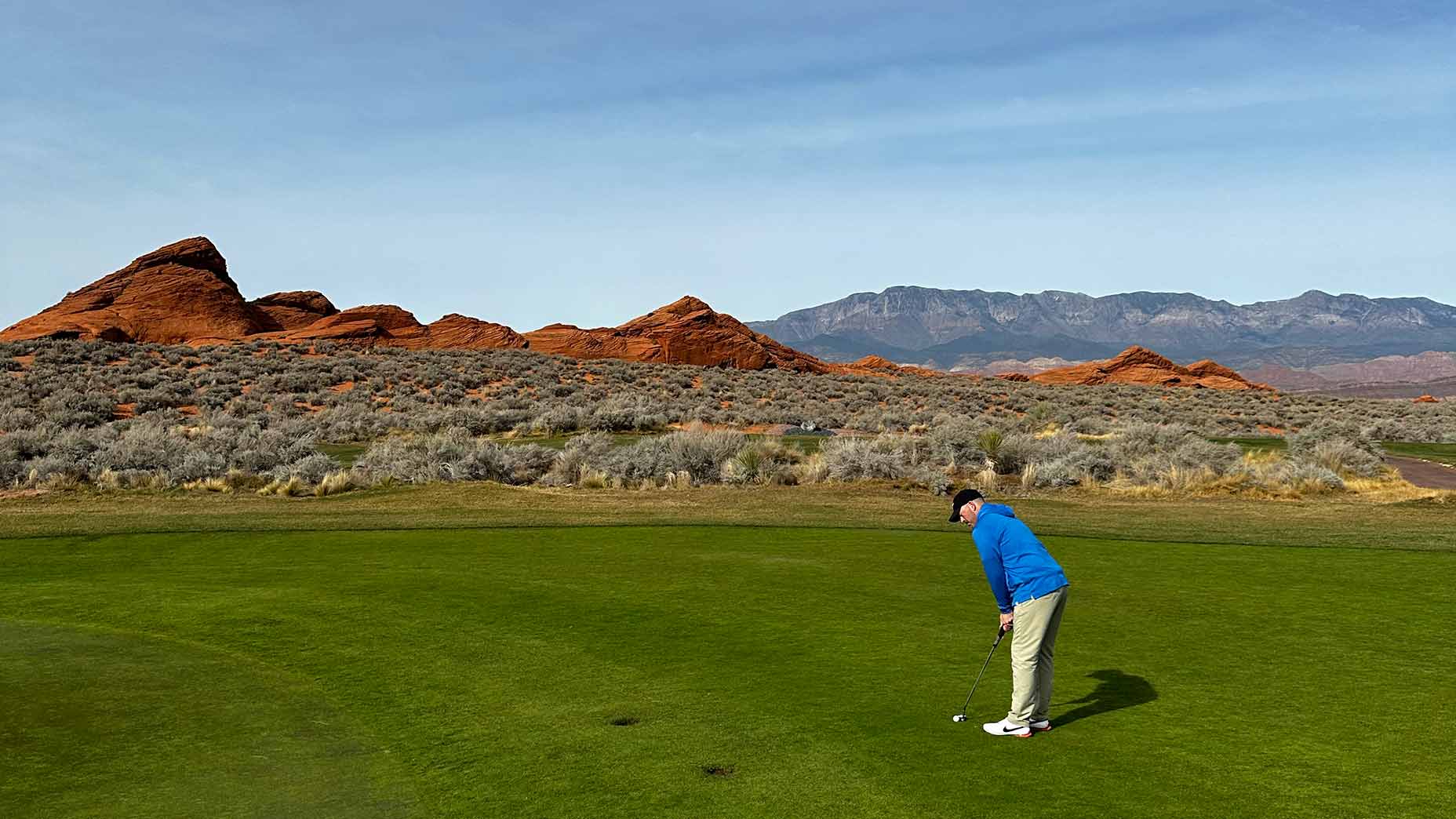 Andrew Miller lines up a putt.