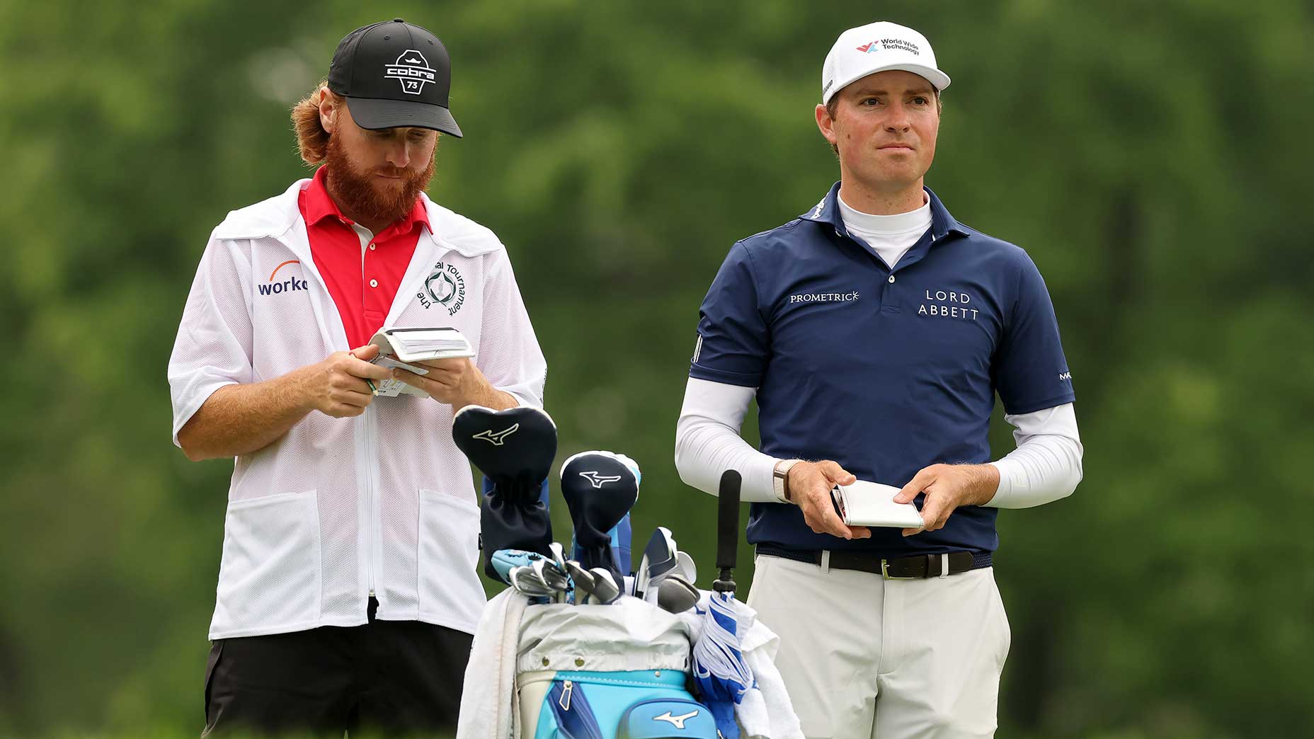 Ben Griffin and his caddie look over a shot during the second round of the Memorial at Muirfield Village on Friday in Dublin, Ohio.