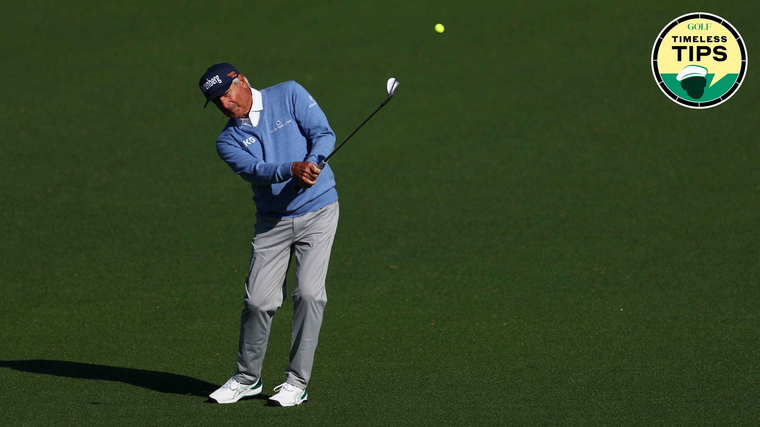 fred couples hits pitch shot during the masters tournament
