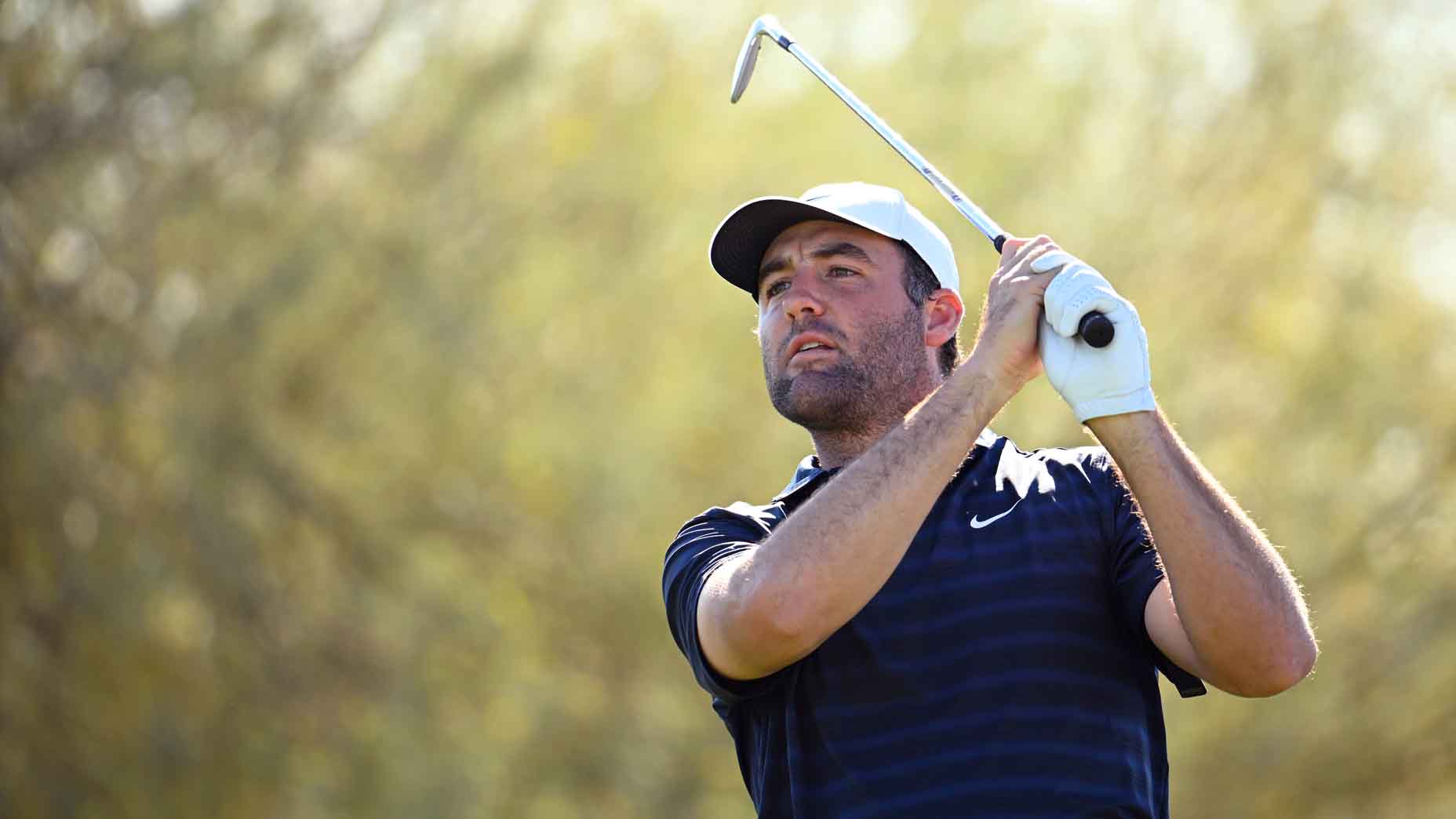 Scottie Scheffler hits a shot at the WM Phoenix Open