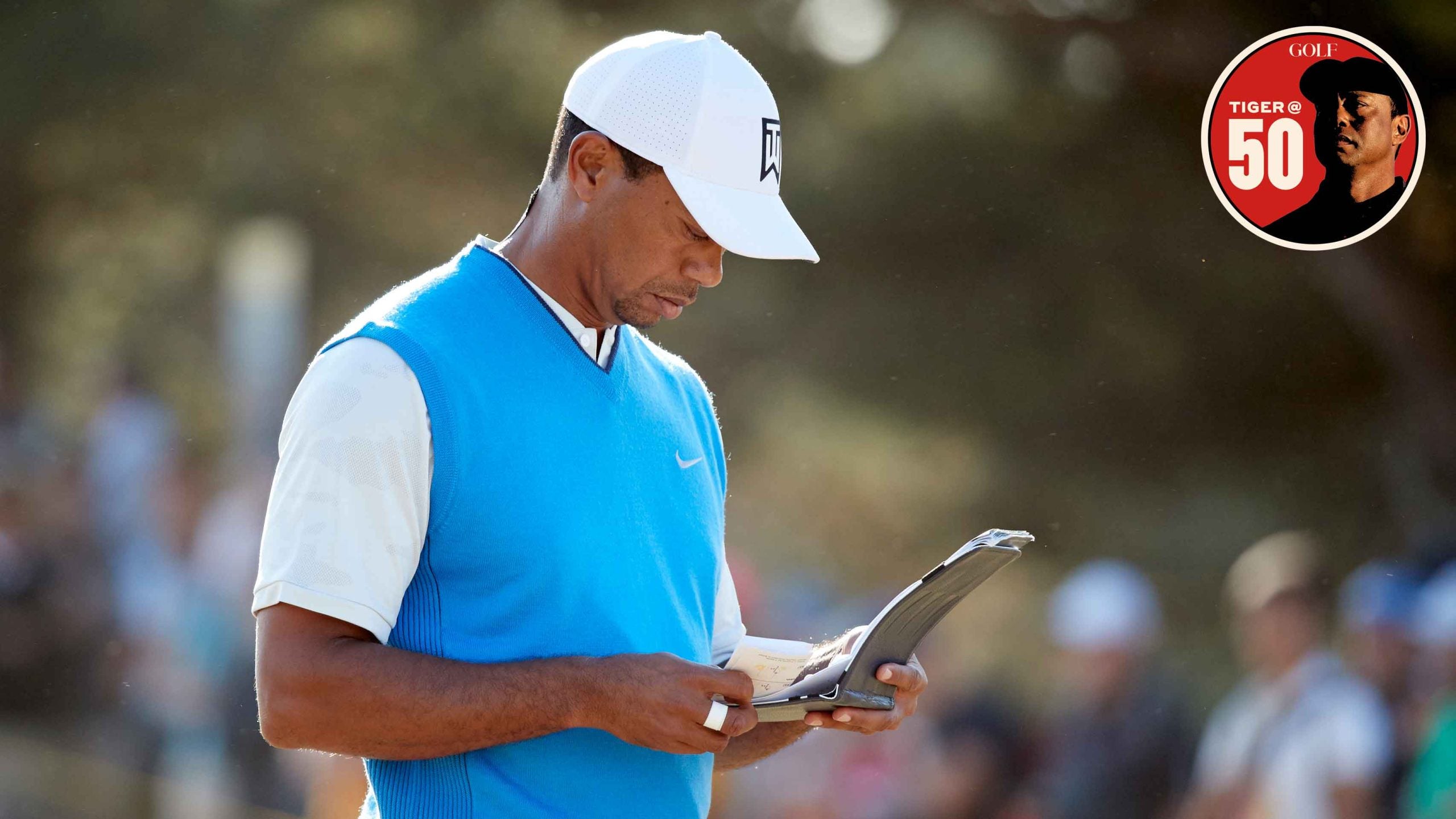 Tiger Woods looks at his scorecard during Thursday play at Carnoustie Golf Links. Carnoustie, Scotland 7/19/2018