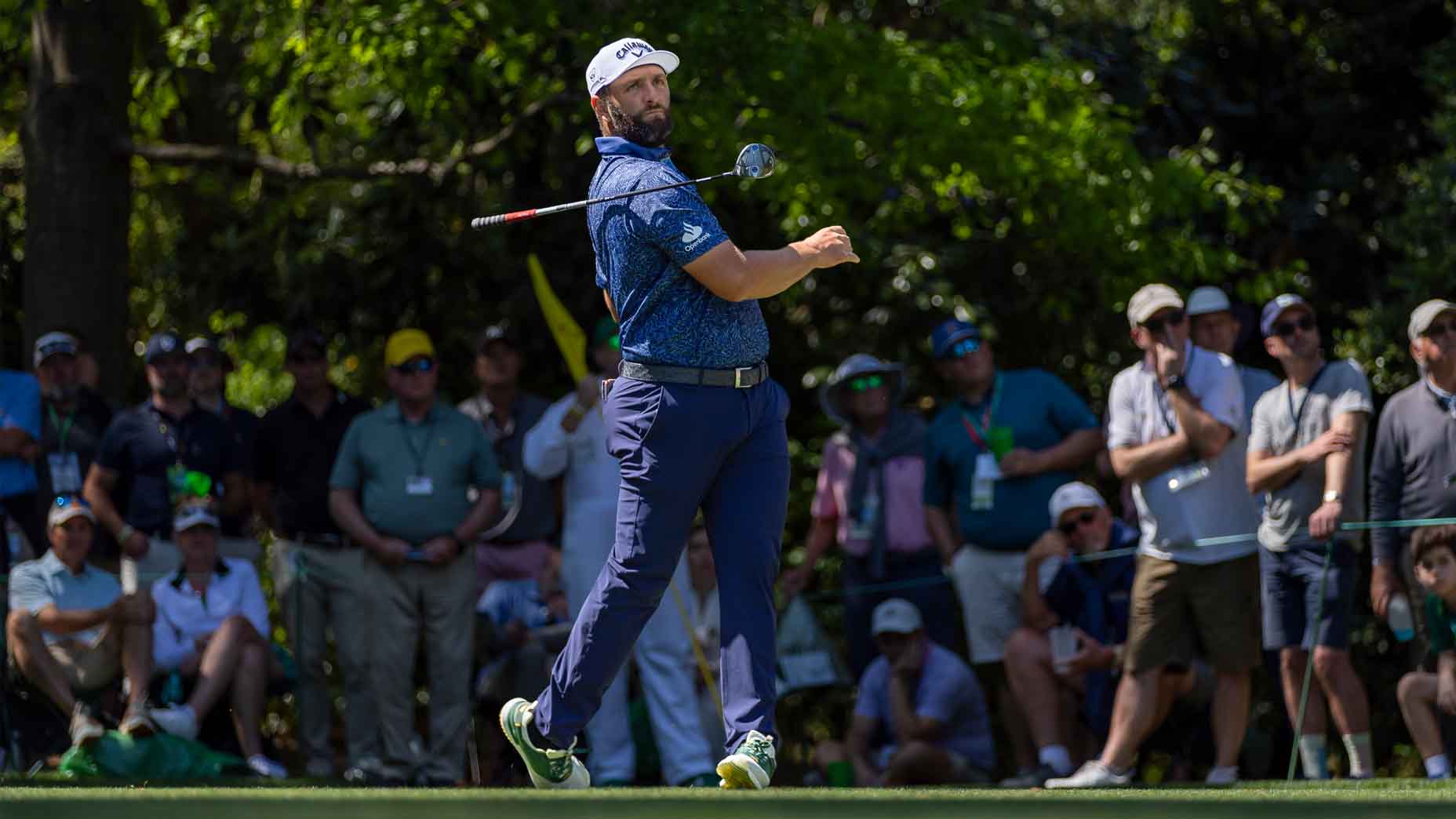 Jon Rahm hits a shot during the first round of the 2025 Masters.