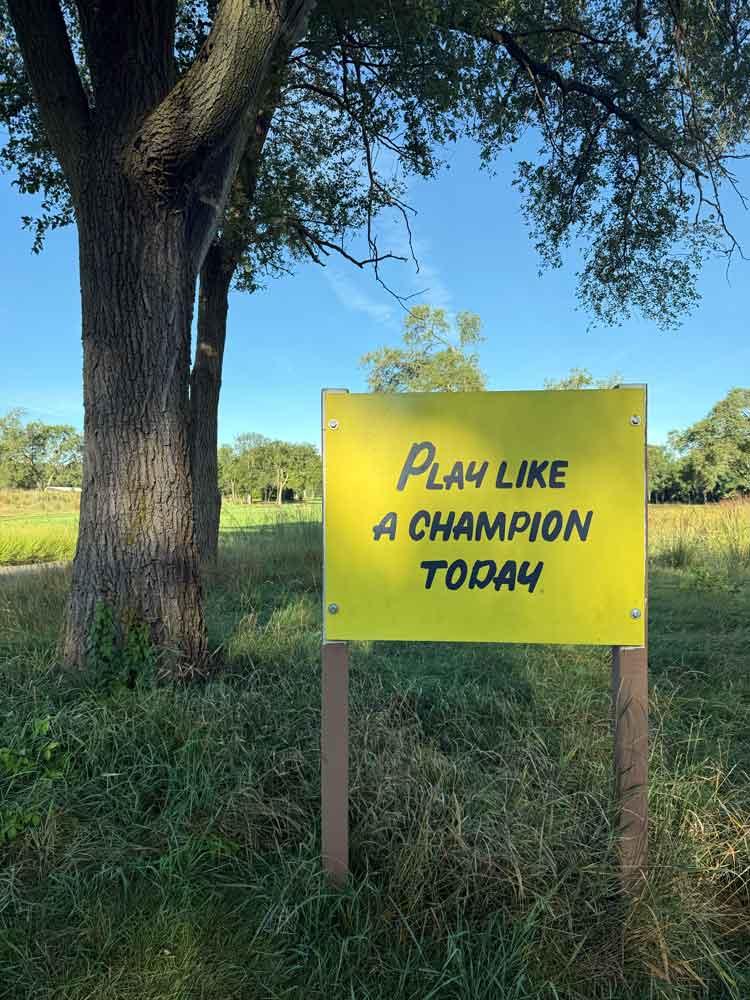 play like a champion today sign